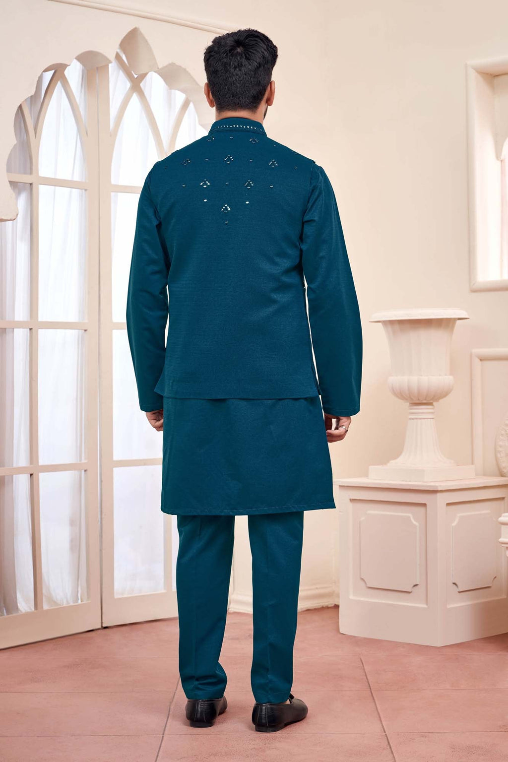 Teal Brilliance: Ethnic Kurta Set With Shimmery Jacket